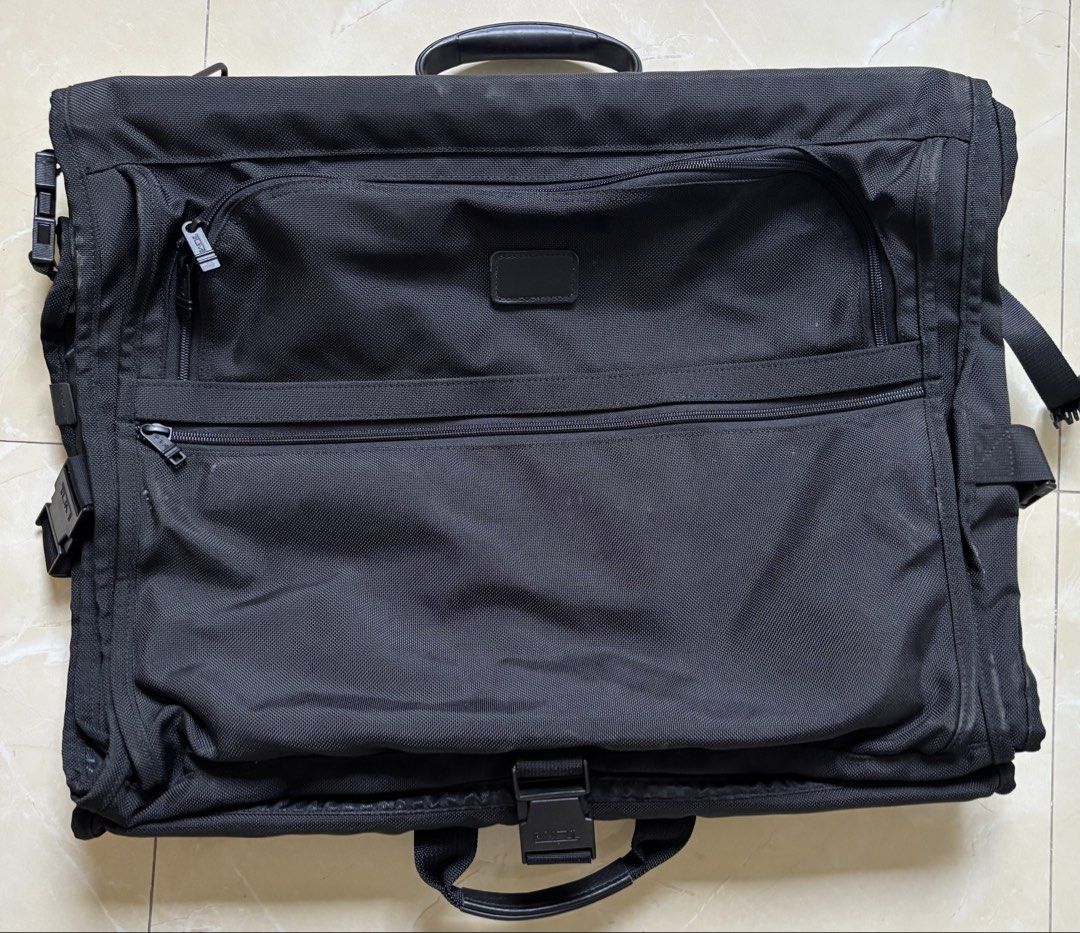 Tumi Garment Bag (Category: Luxury Bags & Wallets) located in San Ildefonso. Submitted by PatchAdamss (Listing ID 1453692110, Image 1). Description: FOR SALE!!! Tumi garment bag Excellent condition All zippers intact Good as brand new 100%legit tumi (You can check tracer at tumi website).