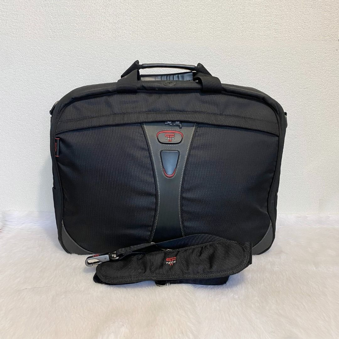 Tumi Tech Black Ballistic Nylon Laptop Messenger Documents Bag (Category: Briefcases) located in Cebu City. Submitted by posh_avenue888 (Listing ID 1453793973, Image 1). Description: In very good condition with normal signs of wear (damaged zipped pulls - please see photos). This bag has multiple compartments for your laptop and other essentials. Made of durable ballistic nylon. 100% Authentic or your money back!!! Measurements (estimated-taken f