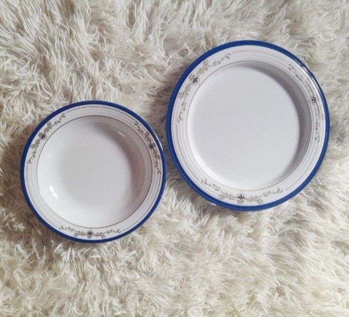 Tupperware Brands Melamine Plates Set of 12 (Category: Dinnerware & Cutlery) located in Quezon City. Submitted by kyleenscloset (Listing ID 1453645558, Image 1). Description: ♡Set of 12 Tupperware Select Line dinner plates and bowl ♡10" plates (6pcs) ♡300ml capacity deep plate/bowls (6pcs) ♡White base with blue rim ♡Stackable design for convenient storage.