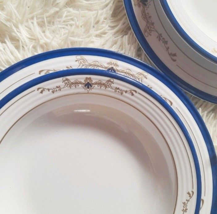 Tupperware Brands Melamine Plates Set of 12 (Category: Dinnerware & Cutlery) located in Quezon City. Submitted by kyleenscloset (Listing ID 1453645558, Image 3). Description: ♡Set of 12 Tupperware Select Line dinner plates and bowl ♡10" plates (6pcs) ♡300ml capacity deep plate/bowls (6pcs) ♡White base with blue rim ♡Stackable design for convenient storage.