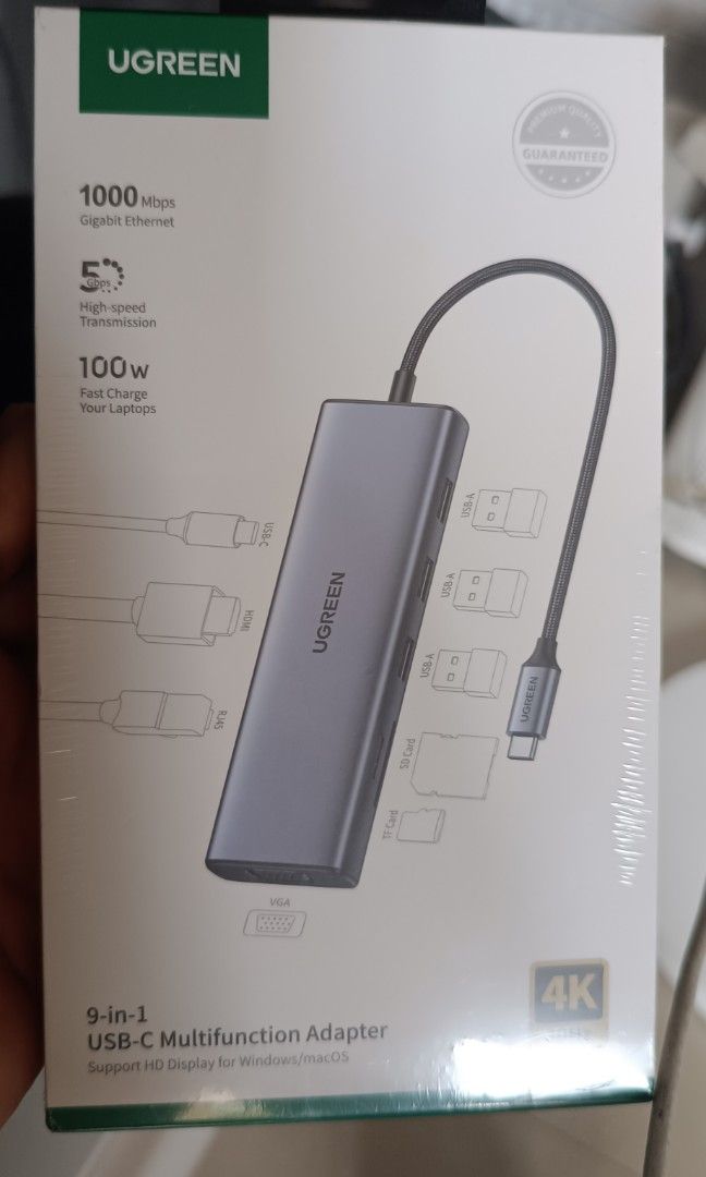 UGREEN 9-in-1 USB-C Multifunction Adapter (Category: Computer Parts) located in Bulacan. Submitted by jasonofalltrades_ (Listing ID 1453641351, Image 1). Description: UGREEN 9-in-1 USB-C Multifunction Adapter (Model CM498 or 15600). 4K HDMI, 1080P VGA, Gigabit Ethernet, 100W PD charging, and multiple USB-A ports. The adapter has an aluminum casing and supports simultaneous use of SD/TF card slots. It is designed for Windows and macOS compatibilit