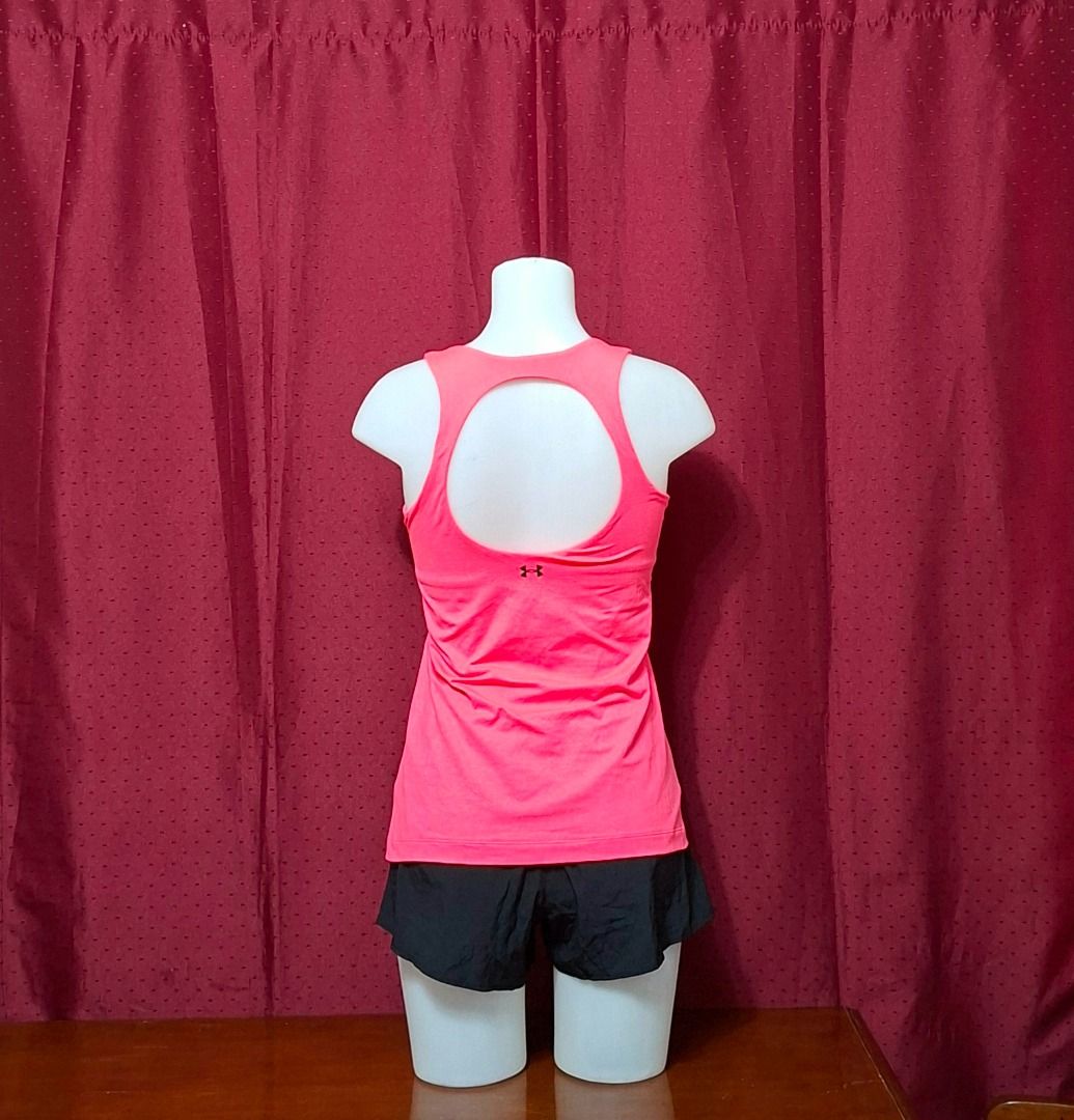 FREE SF! Under Armour Neon Pink Tank Top Size Medium-Large (Preloved) FREE SHIPPING! (Category: Activewear) located in Iligan City. Submitted by Memag (Listing ID 1453699202, Image 2). Description: *FREE SHIPPING! *Seller is not an expert to authenticate the item. *tag removed *like new *fabric - polyester *with pockets for optional, removable cups (pads/cups included) *no issue *size - 6 *Due to lighting, color may vary from actual. *MOP - GCash