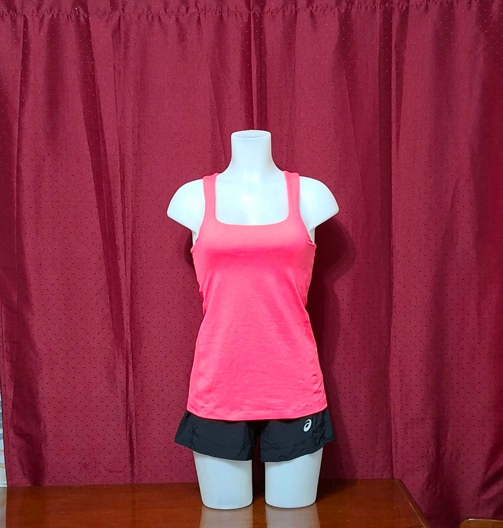FREE SF! Under Armour Neon Pink Tank Top Size Medium-Large (Preloved) FREE SHIPPING! (Category: Activewear) located in Iligan City. Submitted by Memag (Listing ID 1453699202, Image 1). Description: *FREE SHIPPING! *Seller is not an expert to authenticate the item. *tag removed *like new *fabric - polyester *with pockets for optional, removable cups (pads/cups included) *no issue *size - 6 *Due to lighting, color may vary from actual. *MOP - GCash