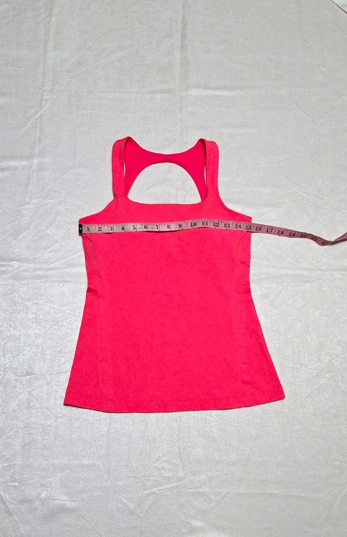 FREE SF! Under Armour Neon Pink Tank Top Size Medium-Large (Preloved) FREE SHIPPING! (Category: Activewear) located in Iligan City. Submitted by Memag (Listing ID 1453699202, Image 3). Description: *FREE SHIPPING! *Seller is not an expert to authenticate the item. *tag removed *like new *fabric - polyester *with pockets for optional, removable cups (pads/cups included) *no issue *size - 6 *Due to lighting, color may vary from actual. *MOP - GCash
