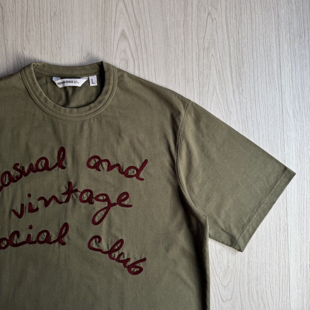 Uniform bridge & Co Embroidered Tee (Category: Tshirts & Polo Shirts ) located in Zamboanga. Submitted by rustic.rev (Listing ID 1453705955, Image 2). Description: Uniform bridge & Co Embroidered Tee In excellent condition, bleach stain last photo not visible when worn. Tagged: Large Measurements: Pit to pit: 22.5 inches Length: 28.5 inches Shoulders: 18.5 inches ₱690 + sf Dm or comment “mine” to purchase 📩.