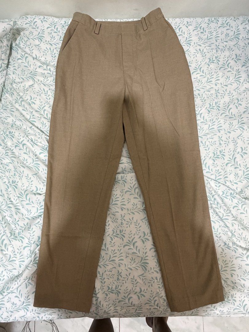 Uniqlo Beige Tailored Pants Size S (Category: Other Bottoms) located in Manila. Submitted by reginemariev (Listing ID 1453709615, Image 1). Description: - Uniqlo Beige Tailored Pants - Size: S - Waist: Elastic, fits 60-66cm - Hip: Fits 85-91cm - Material: Polyester Blend - Origin: Made in China.