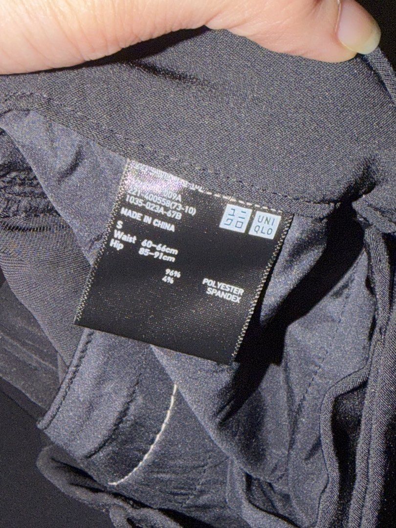 Uniqlo Black Pleated Jogger Pants (Category: Other Bottoms) located in San Juan City. Submitted by Pierrelot (Listing ID 1453716177, Image 2). Description: - Uniqlo Black Jogger Pants - High-waisted with pleated front - Elasticated cuffs for a snug fit - Comfortable polyester and spandex blend - Perfect for stylish everyday wear.