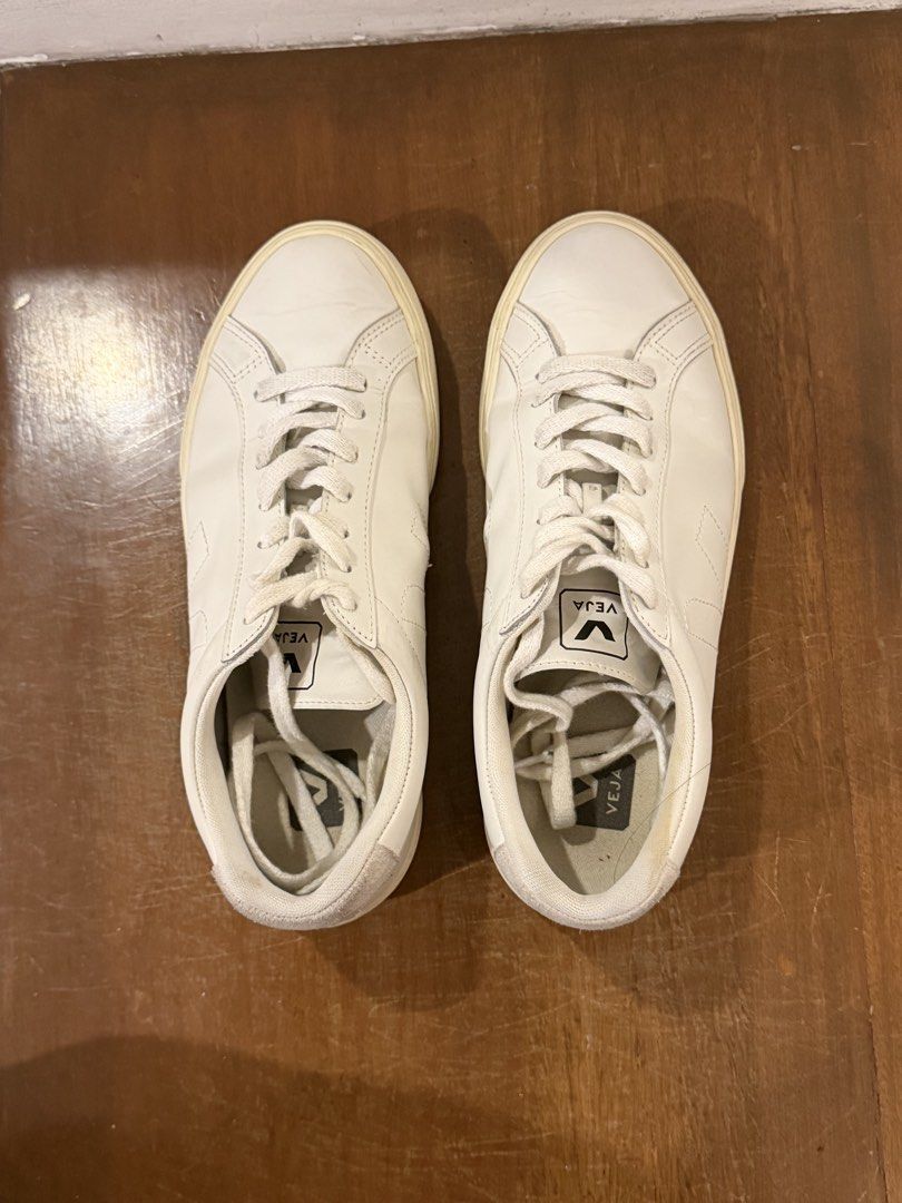 Veja Esplar (Category: Sneakers) located in Quezon City. Submitted by aa514 (Listing ID 1453756027, Image 2). Description: - White leather Veja sneakers - Size: 39 EUR (US 8, UK 6, JPN 25, BR 37) - Made in Brazil - Classic low-top style - Suede heel detail - Soles show some wear - Great for everyday use.
