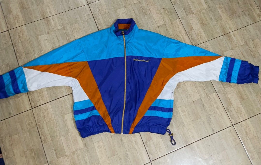 Vintage 90s Nike International Windbreaker Jacket (Category: Coats, Jackets and Outerwear) located in General Santos City (Dadiangas). Submitted by silvervintage77 (Listing ID 1453662037, Image 3). Description: Vintage 90s Nike InternationalWindbreaker Jacket excellent 10/10 color rate Dimes 26X25 Boxy Fit.