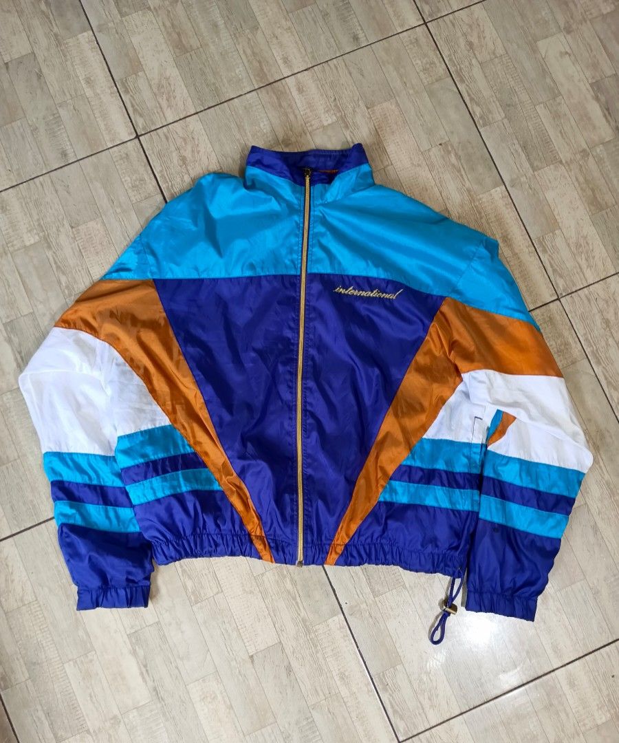 Vintage 90s Nike International Windbreaker Jacket (Category: Coats, Jackets and Outerwear) located in General Santos City (Dadiangas). Submitted by silvervintage77 (Listing ID 1453662037, Image 1). Description: Vintage 90s Nike InternationalWindbreaker Jacket excellent 10/10 color rate Dimes 26X25 Boxy Fit.