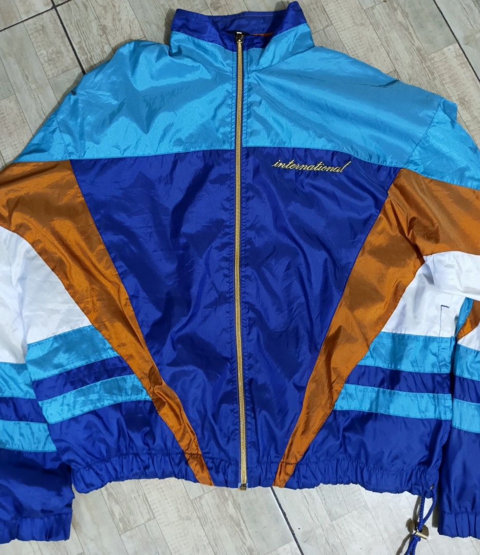 Vintage 90s Nike International Windbreaker Jacket (Category: Coats, Jackets and Outerwear) located in General Santos City (Dadiangas). Submitted by silvervintage77 (Listing ID 1453662037, Image 2). Description: Vintage 90s Nike InternationalWindbreaker Jacket excellent 10/10 color rate Dimes 26X25 Boxy Fit.