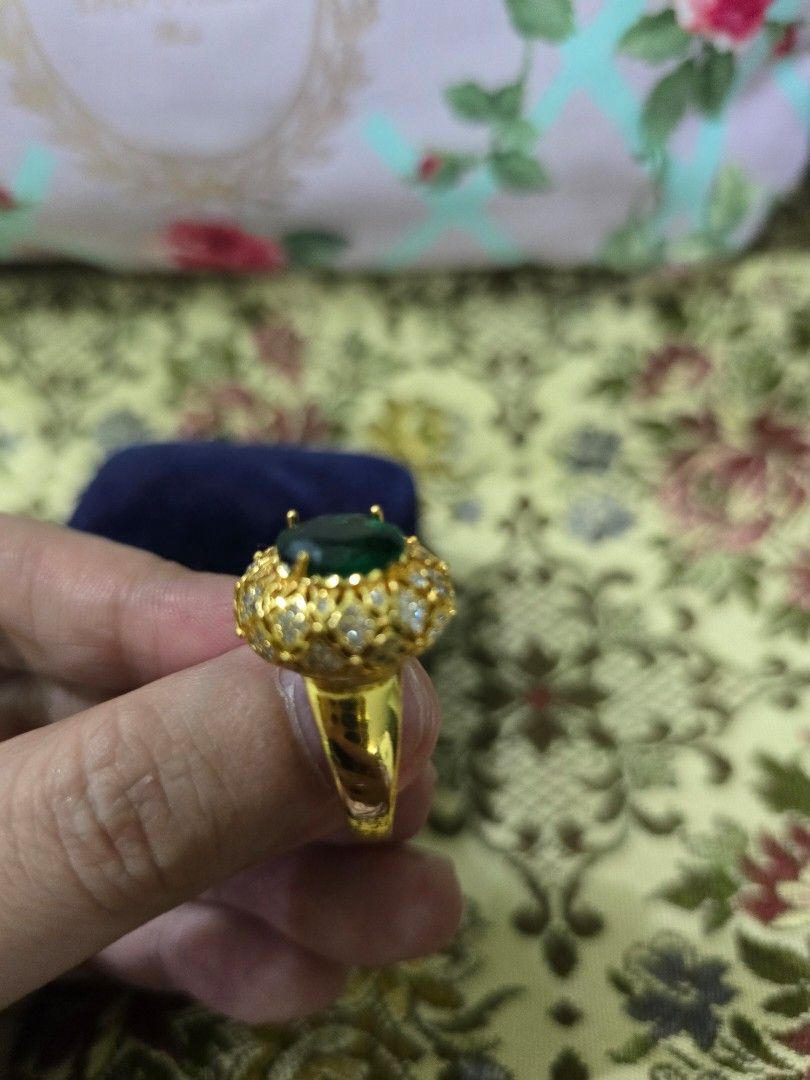Vintage Emerald Ring with Zircon Accents (Category: Rings) located in Santa Rosa. Submitted by crystal1.0 (Listing ID 1453758431, Image 2). Description: - Elegant gold ring stainless steel - Features a large, vibrant emerald stone - Intricately designed band - Includes a luxurious velvet jewelry box from HAKUYO PEARLS HOTEL NEW GRAND YOKOHAMA - Perfect statement piece for any occasion.