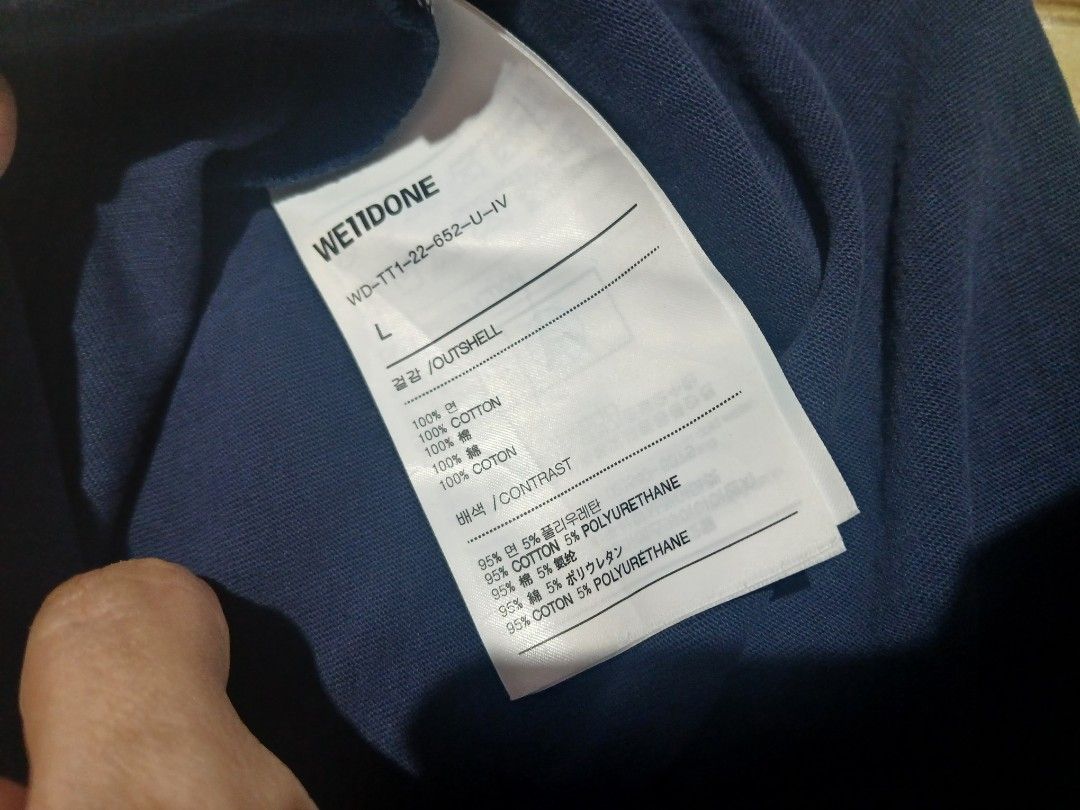 WE11DONE Navy Bear Graphic T-Shirt Size (Category: Tshirts & Polo Shirts ) located in Las Pinas. Submitted by rcp123 (Listing ID 1453723147, Image 3). Description: - Brand: WE11DONE - Color: Navy Blue - Size: L - Design: Green bear graphic on front and back - Material: 100% Cotton (check label for specifics) - Style: Casual wear 28 x 23 .