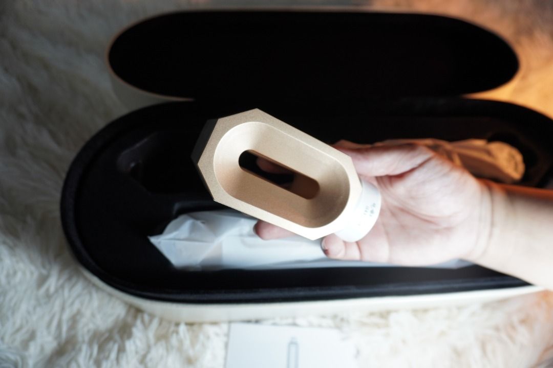 White and Gold Automatic Hair Curler with Case (Category: Hair) located in Manila. Submitted by iceypops (Listing ID 1453726215, Image 2). Description: - Automatic hair curler - Elegant white and gold design - Comes with a convenient travel case - Effortless styling for quick curls - Includes various attachments - Perfect for styling on the go.