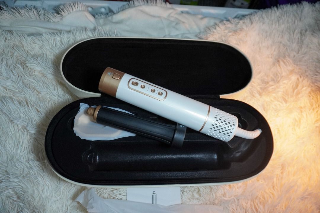 White and Gold Automatic Hair Curler with Case (Category: Hair) located in Manila. Submitted by iceypops (Listing ID 1453726215, Image 1). Description: - Automatic hair curler - Elegant white and gold design - Comes with a convenient travel case - Effortless styling for quick curls - Includes various attachments - Perfect for styling on the go.