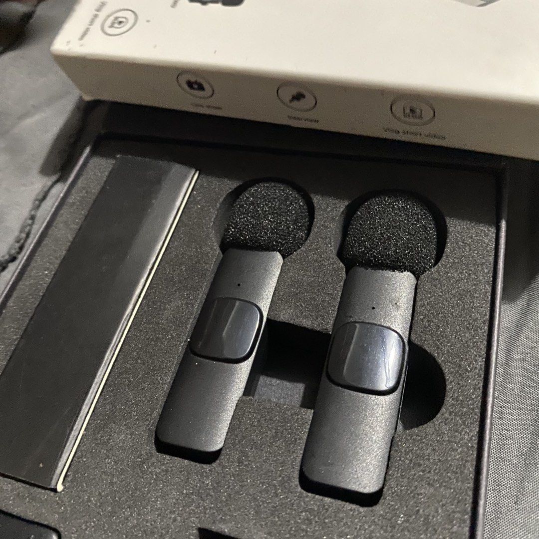 Wireless Lavalier Microphone Set for iPhone (Category: Microphones) located in Iba. Submitted by leovincee.1414 (Listing ID 1453792065, Image 1). Description: - Wireless clip-on microphone - Perfect for vlogging, interviews, and live streams - Comes with a convenient charging case - Includes a Lightning adapter for iPhone compatibility - Easy plug-and-play setup - Delivers clear, high-quality audio for your videos .