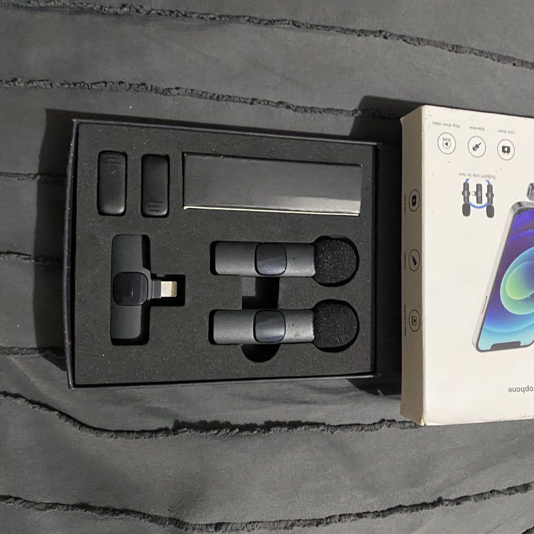 Wireless Lavalier Microphone Set for iPhone (Category: Microphones) located in Iba. Submitted by leovincee.1414 (Listing ID 1453792065, Image 2). Description: - Wireless clip-on microphone - Perfect for vlogging, interviews, and live streams - Comes with a convenient charging case - Includes a Lightning adapter for iPhone compatibility - Easy plug-and-play setup - Delivers clear, high-quality audio for your videos .