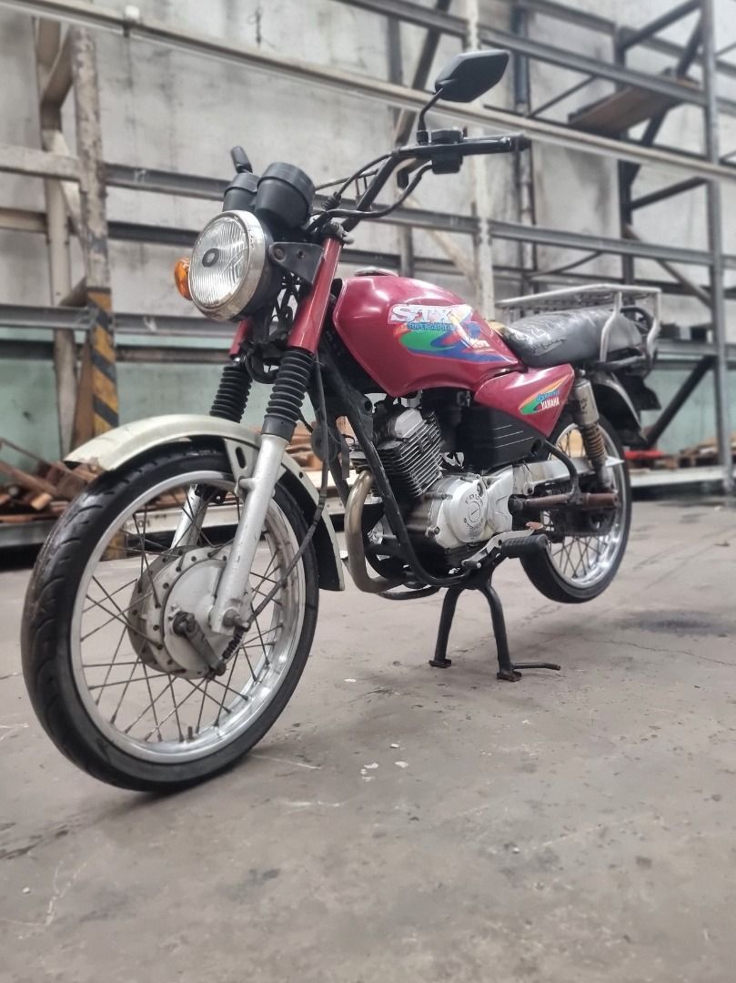 YAMAHA STX 125cc 2003 Model (Category: Motorbikes for Sale) located in Quezon City. Submitted by kontaktpoint (Listing ID 1453723743, Image 1). Description: YAMAHA STX 125cc 2003 Model Color: Red Company Owned Service Vehicle, Completer LTO Documents ₱15,000.00 or Best Offer. Contact Person: Ms. Emily Contact Number: 09772591198.