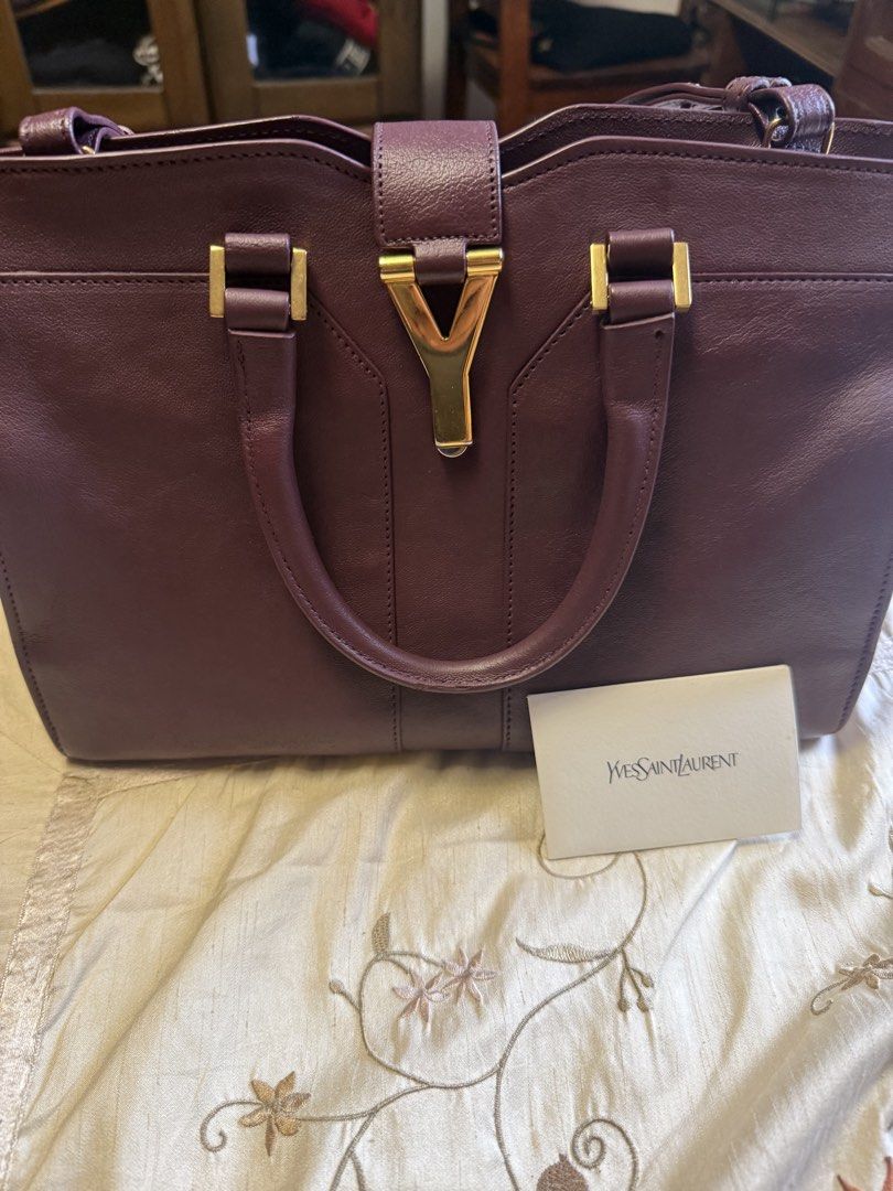 Yves Saint Laurent Cabas bag (Category: Luxury Bags & Wallets) located in Quezon City. Submitted by d8bhk9y4rs (Listing ID 1453635250, Image 1). Description: 2 way bag Recolored from red to Burgendy No flaws Authentic .