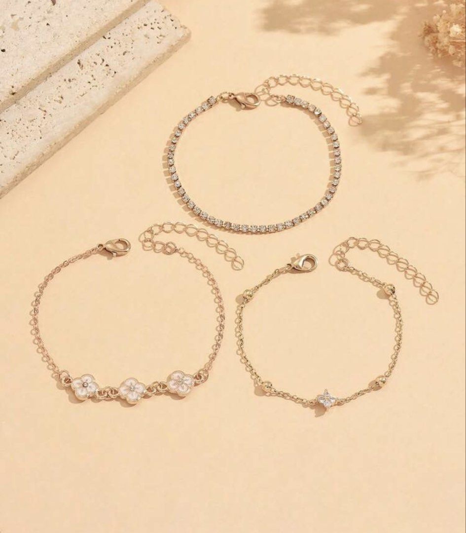 3pc Rose Gold Clover & Crystal Bracelet Set (Category: Bracelets) located in Manila. Submitted by decluterthings888 (Listing ID 1453868347, Image 1). Description: - Set of 3 bracelets - Delicate chain with crystal charm - Tennis bracelet with clear stones - Rose gold clover charms with white enamel - Adjustable clasps - Perfect for layering or wearing separately.