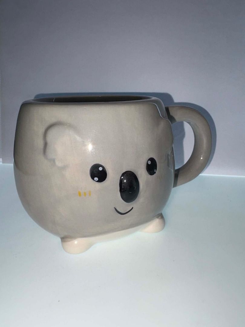 🐨 Adorable Koala Ceramic 3D Mug ☕🌿 (Category: Coffee & Tea Tableware) located in Caloocan City. Submitted by rabbithole2026 (Listing ID 1453813805, Image 1). Description: Cute and whimsical ceramic mug featuring an adorable koala design with sculpted ears, little feet, and a sweet smiling face. Its rounded shape and charming details make it perfect for coffee, tea, hot chocolate, or displaying in a collection..