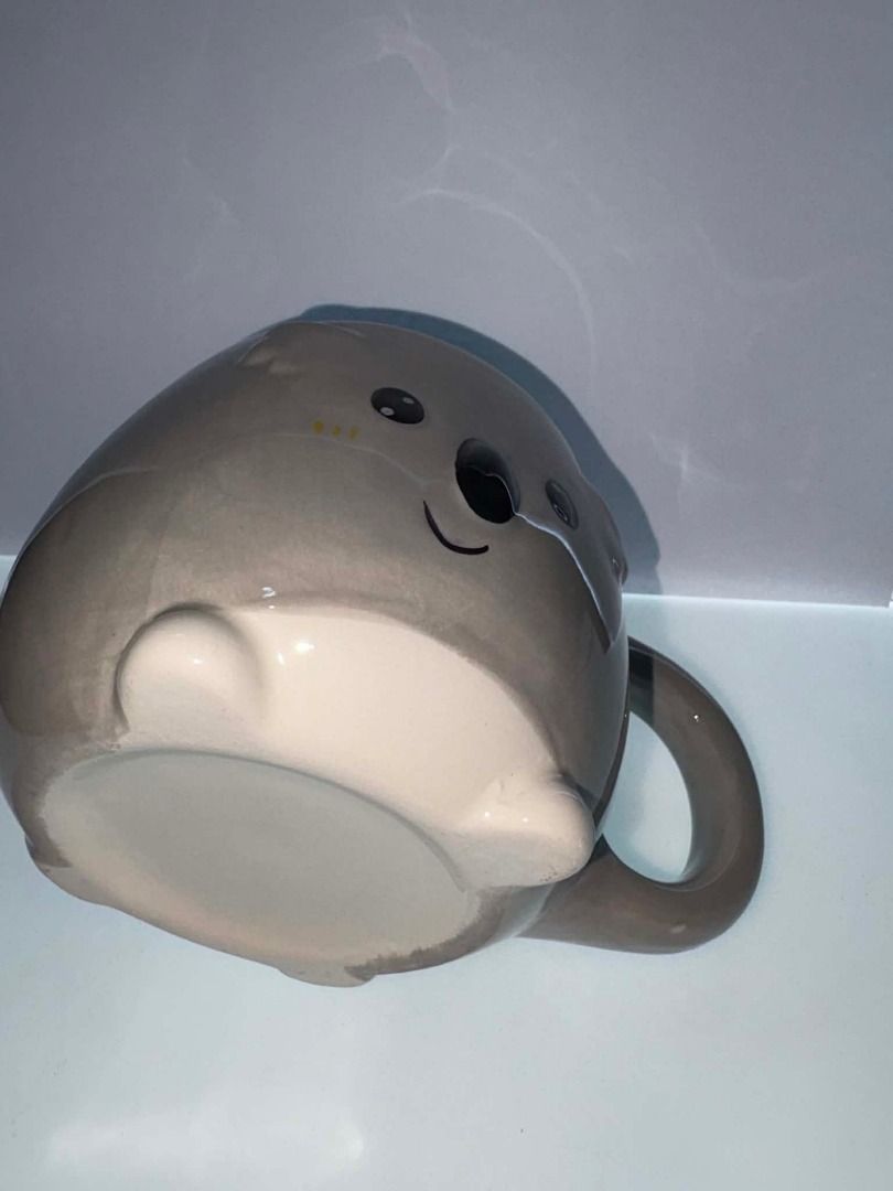 🐨 Adorable Koala Ceramic 3D Mug ☕🌿 (Category: Coffee & Tea Tableware) located in Caloocan City. Submitted by rabbithole2026 (Listing ID 1453813805, Image 2). Description: Cute and whimsical ceramic mug featuring an adorable koala design with sculpted ears, little feet, and a sweet smiling face. Its rounded shape and charming details make it perfect for coffee, tea, hot chocolate, or displaying in a collection..