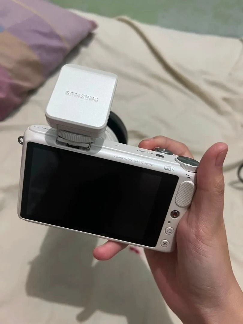 📸 Samsung NX2000 (Category: Cameras) located in Caloocan City. Submitted by el_lachica.014 (Listing ID 1453910295, Image 2). Description: 📸 Samsung NX2000 Full Details SPECS: - Type: Mirrorless , APS-C sensor - Resolution: 20.3MP, Full HD video - Screen: 3.7" touchscreen - Features: Built-in WiFi/NFC, ISO up to 25600, 8fps burst - Lens: 20-50mm f/3.5-5.6 II zoom + hood + external flash - Storage: 16GB Kingston microSD card included - Condition: