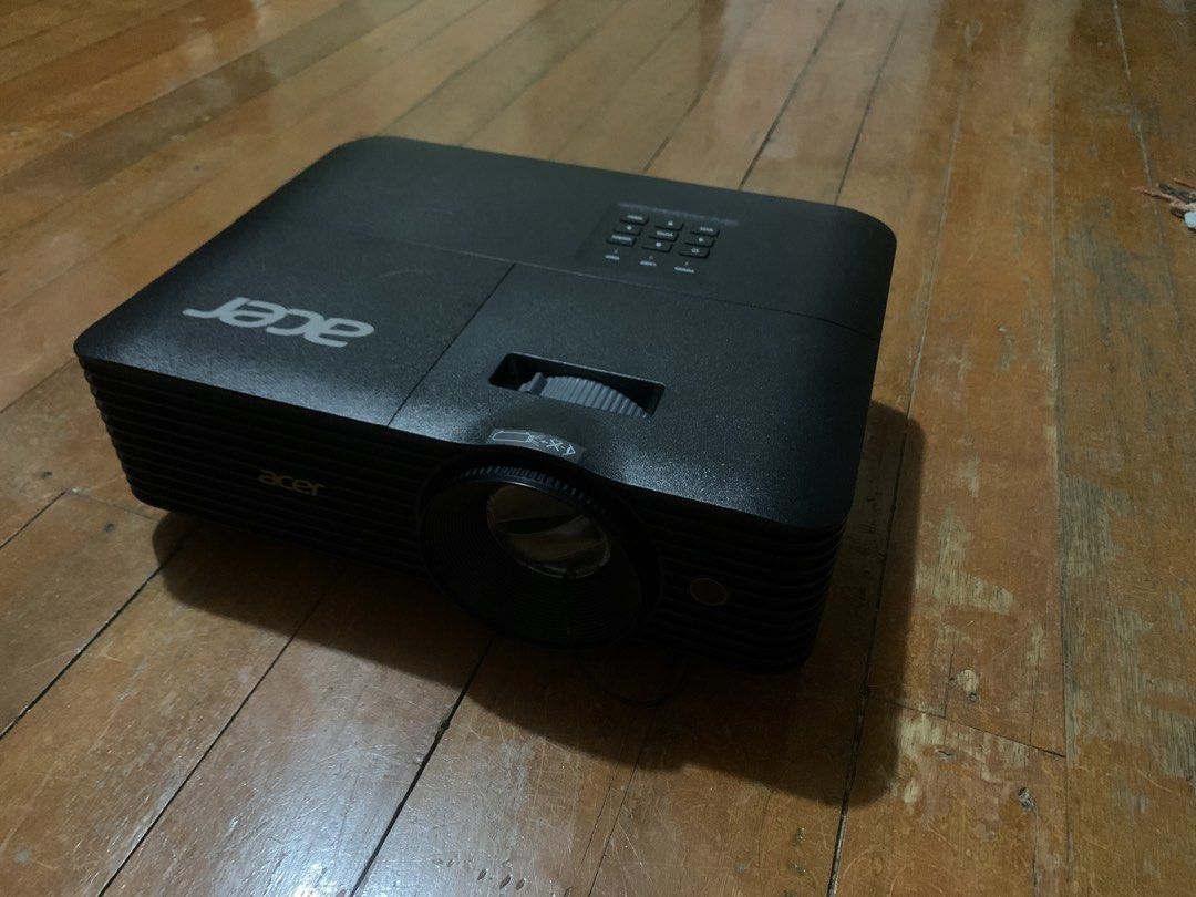 Acer Projector with Bag and Accessories (Category: Projectors) located in Manila. Submitted by camrica (Listing ID 1453947251, Image 2). Description: bought back in 2024 but barely used, so it still feels new - Acer projector for sale - Includes original carrying bag - All original accessories included: remote, power cable, VGA cable, and other cables shown - Tested and confirmed working - Ideal for presentations or home theater setup.