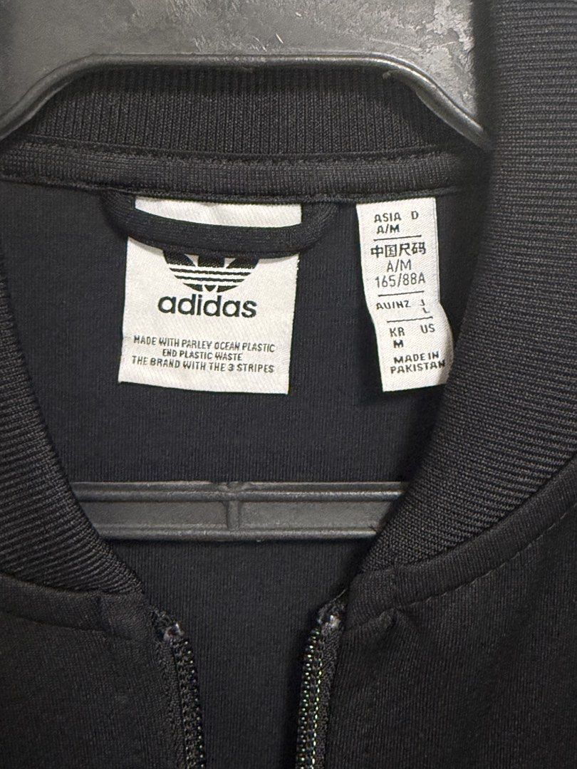 Adidas Double Zip Jacket (Category: Coats, Jackets and Outerwear) located in Imus. Submitted by tpdecluttering (Listing ID 1453970166, Image 3). Description: Classic Adidas track jacket in black .