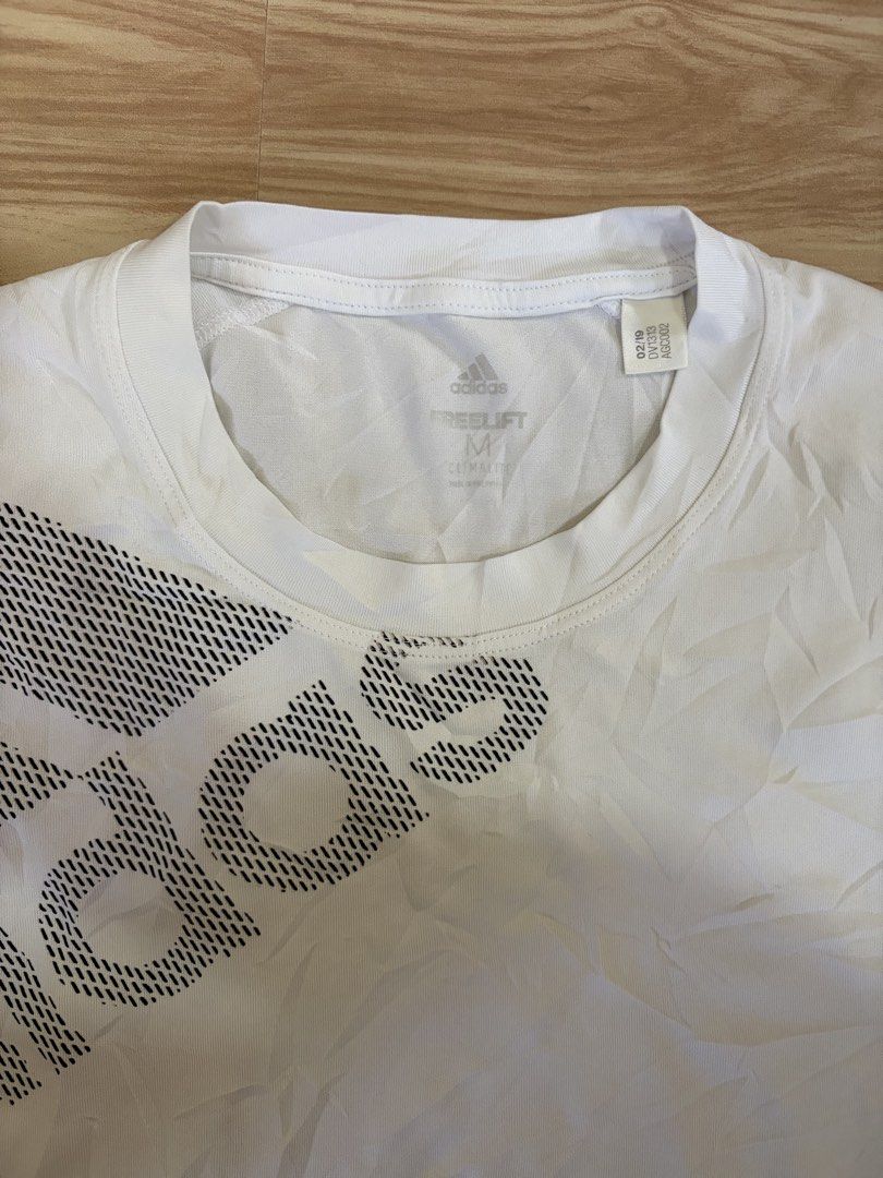 Adidas FreeLift T-shirt White Size M (Category: Tshirts & Polo Shirts ) located in Manila. Submitted by trif21 (Listing ID 1453899786, Image 2). Description: - White Adidas T-shirt - Features iconic Adidas logo on the front - FreeLift design for enhanced movement - Size Medium (M) - Perfect for workouts or casual wear - Please check photos for detailed condition.