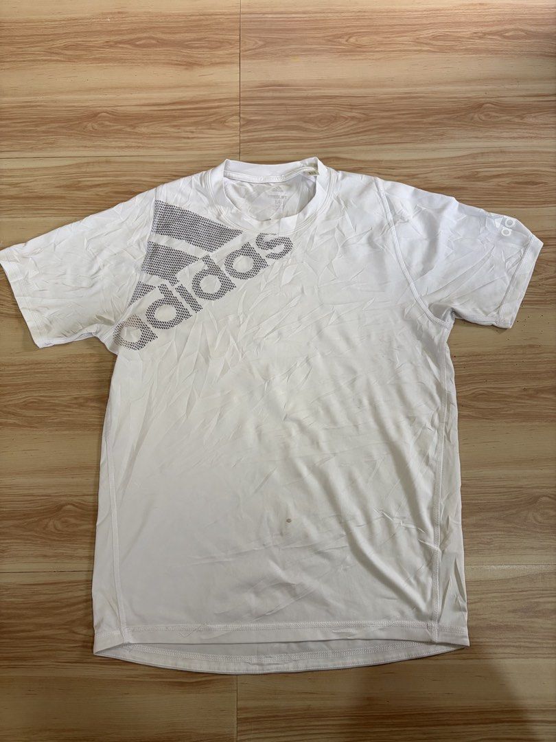 Adidas FreeLift T-shirt White Size M (Category: Tshirts & Polo Shirts ) located in Manila. Submitted by trif21 (Listing ID 1453899786, Image 1). Description: - White Adidas T-shirt - Features iconic Adidas logo on the front - FreeLift design for enhanced movement - Size Medium (M) - Perfect for workouts or casual wear - Please check photos for detailed condition.
