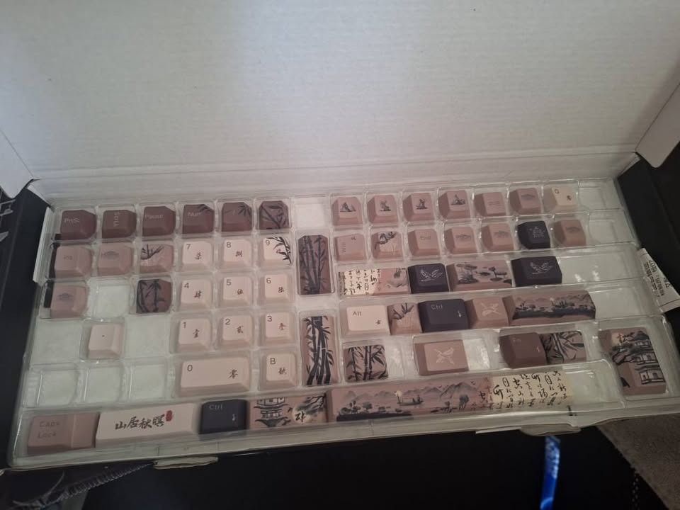 AKKO PBT Mountain Seclusion keycaps (Category: Computer Keyboard) located in Caloocan City. Submitted by granddragon_9213ab (Listing ID 1453991733, Image 3). Description: -Originally 2895. Rush, so price is negotiable. Will only attempt to sell until aug 10. - Unique Japanese landscape design (mountains, boats, traditional script) - Muted earth tones for a vintage aesthetic - Compatible with most mechanical keyboards - Elevate your keyboard setup