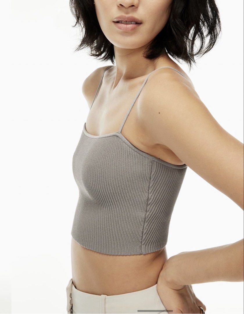 Aritzia Babaton Sculpt Knit White Cami Cropped Top (Category: Sleeveless) located in San Juan City. Submitted by keep.it.clean (Listing ID 1453860292, Image 3). Description: - everyday basic essential - adjustable straps This is a fully fashioned cropped tank with adjustable straps and a square neckline. It’s made with Sculpt Knit — Babaton’s signature figure-smoothing yarn. The perfect amount of stretch hugs in the right places to shape and scul