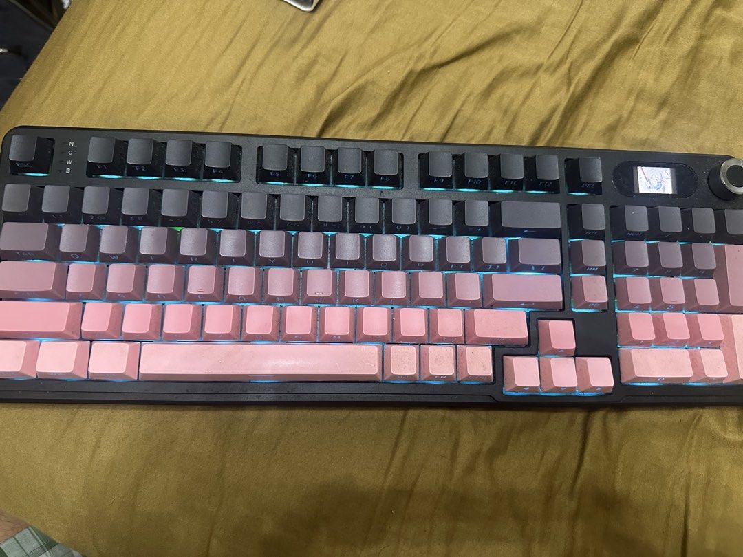 ATTACK SHARK X98 PRO KEYBOARD (Category: Computer Keyboard) located in Manila. Submitted by okslangtayo (Listing ID 1453889645, Image 1). Description: - Stylish Grey & Pink Keycaps - Vibrant RGB Backlighting - Integrated Mini Screen (Top Right) - Convenient Rotary Knob - Ideal for Gaming & Typing - Sold As Is Attack shark x98 pro no issues. Comes with cable and extra switches. Still has the 2.4ghz dongle and bluetooth works No issues Slightly neg