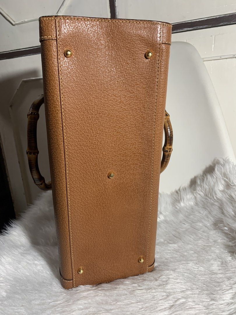 Authentic Gucci Diana Handbag (Category: Luxury Bags & Wallets) located in Pasig City. Submitted by wandererme (Listing ID 1453935956, Image 2). Description: - Classic brown leather handbag - Unique bamboo handle - Structured shape, ideal for everyday use - Spacious interior, flaws: powdery but cleaned already - Beautiful textured leather finish - A timeless, versatile piece - 💯Authentic Gucci Diana Bamboo Handbag includes - DM for the price.