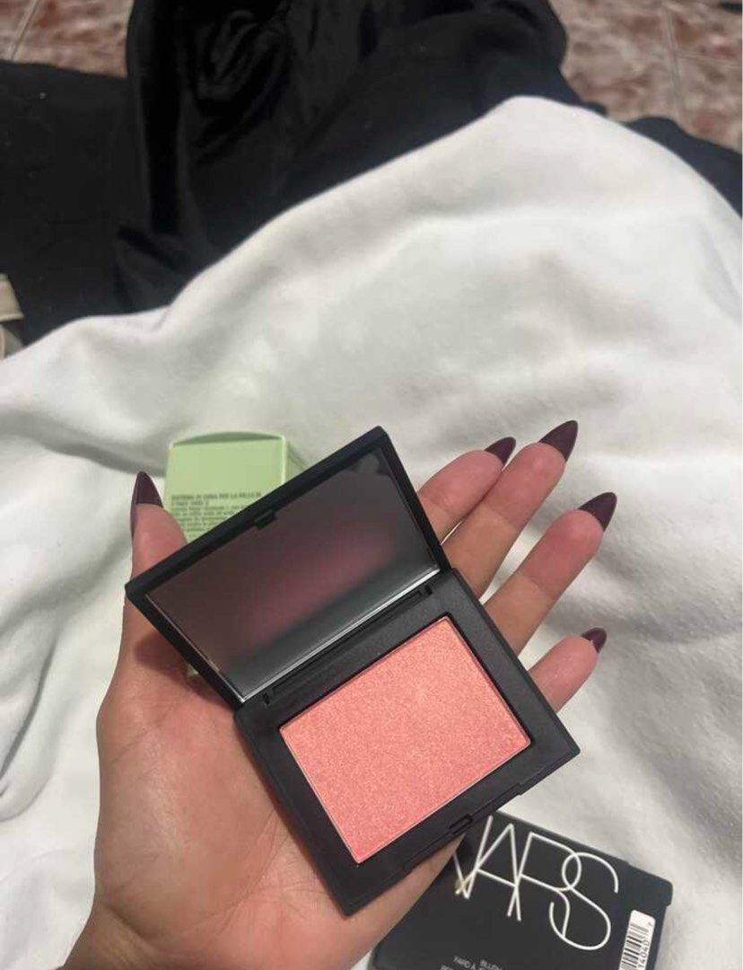 Authentic NARS Blush - Orgasm (Category: Makeup) located in Abucay. Submitted by dianaclutz (Listing ID 1454002888, Image 2). Description: - NARS Blush - Shade: Orgasm - Color: Popular peachy-pink with subtle shimmer - Versatile: Suits many skin tones - Includes: Original box - Effect: Adds a healthy flush to cheeks.