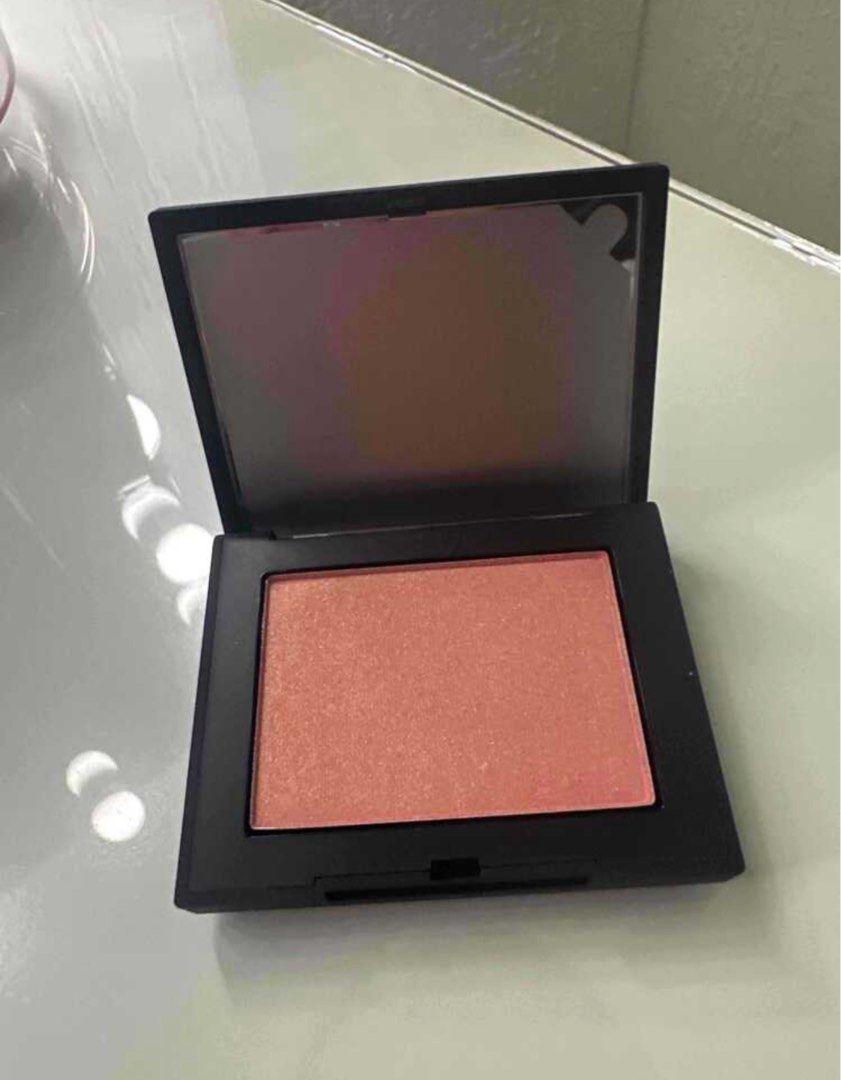 Authentic NARS Blush - Orgasm (Category: Makeup) located in Abucay. Submitted by dianaclutz (Listing ID 1454002888, Image 3). Description: - NARS Blush - Shade: Orgasm - Color: Popular peachy-pink with subtle shimmer - Versatile: Suits many skin tones - Includes: Original box - Effect: Adds a healthy flush to cheeks.