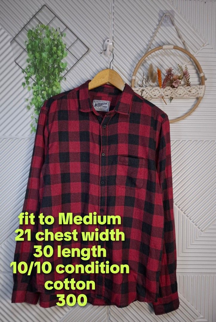 Authentic Red & Black Buffalo Plaid Flannel Shirt (Category: Tshirts & Polo Shirts ) located in Bulacan. Submitted by cathycampo51092 (Listing ID 1453828168, Image 2). Description: - Classic red and black buffalo plaid flannel shirt - Long sleeves with button cuffs - Single chest pocket - Made from 100% cotton - Fits a Medium size - Chest width: 21 inches - Length: 30 inches - Great for layering or wearing on its own.