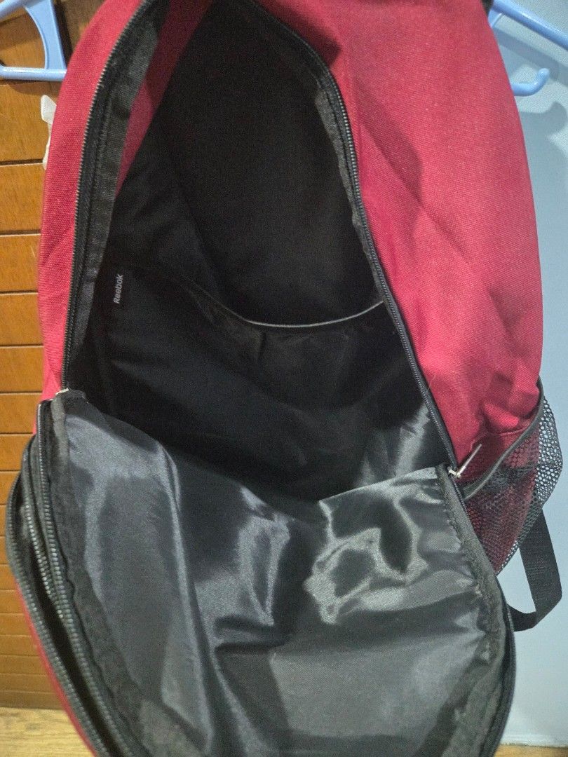 Authentic Reebok Backpack - Maroon/Black (School / Gym Bag) (Category: Backpacks) located in Quezon City. Submitted by chennister (Listing ID 1453992292, Image 3). Description: RFS: Decluttering stuff for shs . Selling lightly used, authentic reebok backpack in maroon and black colorway. Brand: Reebok (100% Authentic) Condition: 8.5/10 (No rips, no holes, all zippers perfect) Interior: Super clean black lining with zero stains or peeling (see pho