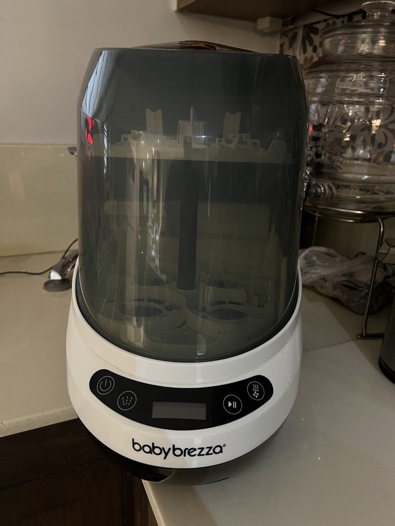 Baby Breeza bottle washer (Category: Breastfeeding & Bottle Feeding) located in Makati City. Submitted by hello.declutter.me (Listing ID 1453825119, Image 1). Description: Comes with dishwasher tablets.