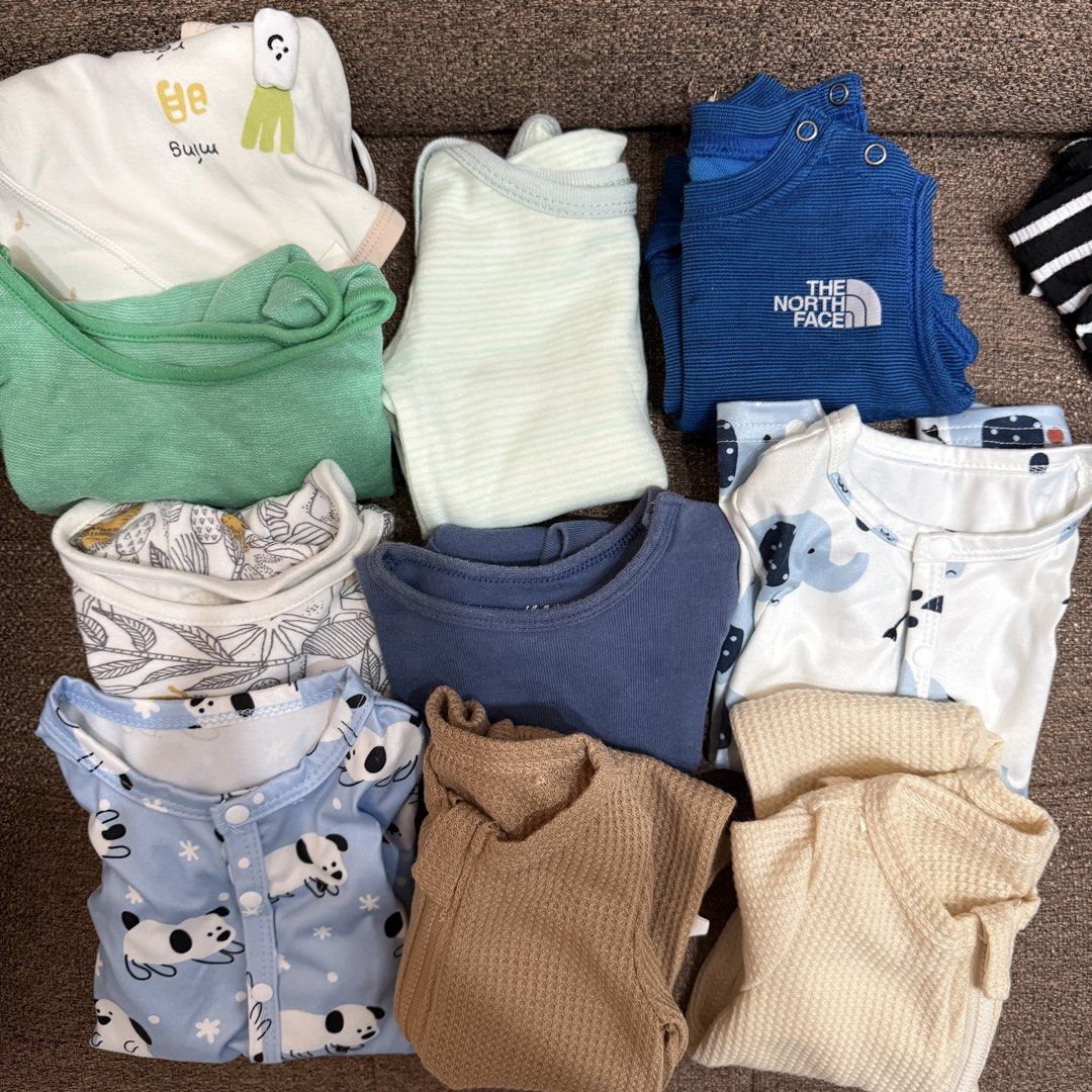 Baby Onesies & Rompers Bundle (Category: Babies & Kids Fashion) located in Manila. Submitted by declutter_807 (Listing ID 1453925100, Image 1). Description: - Bundle of baby clothes including onesies and rompers. - Features a mix of long-sleeved and short-sleeved styles. - Available in various prints and colors, perfect for everyday wear. - All items are clean and ready for their new home. - Some clothes are 0-1 on tag but can fit up to 3 months.