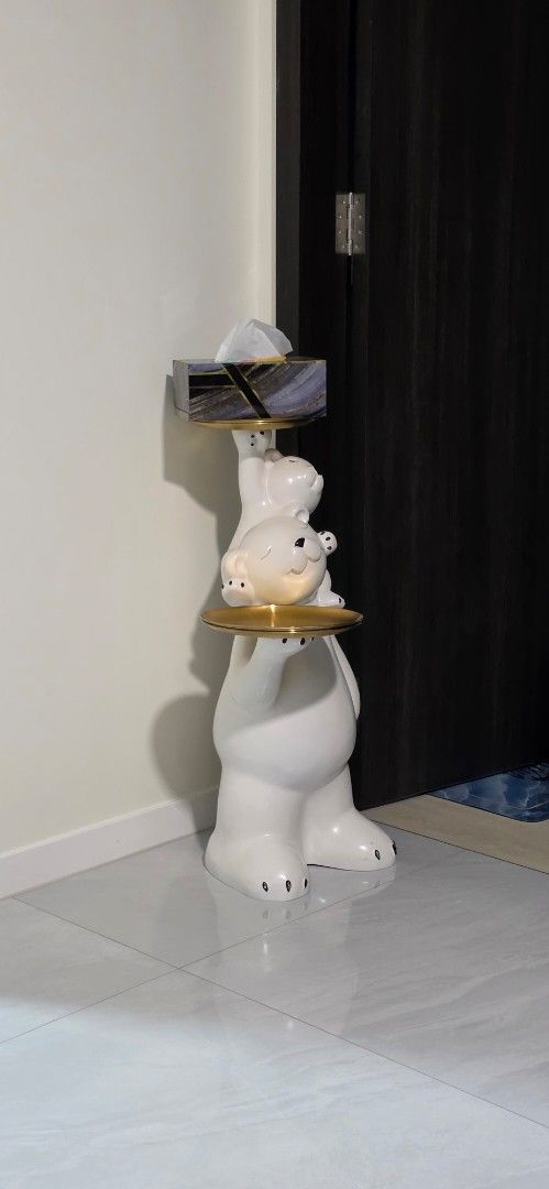 Bear side table (Category: Tables & Sets) located in Singapore. Submitted by maplesyrup56 (Listing ID 1453928372, Image 1). Description: - Adorable bear-themed side table - Features a charming design with a mama bear and cubs - Includes a stylish gold accent - Perfect for holding tissues or small items.