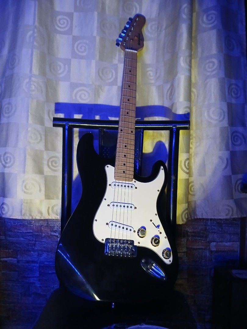 Behringer Electric Guitar - Black Strat Style (Category: Musical Instruments) located in Manila. Submitted by oddphoenix-4e1a (Listing ID 1453980542, Image 1). Description: P3,800 Pickup or lalamove Behringer Electric Guitar. Stratocaster style body. Maple neck with 22 frets. Three single-coil pickups. Chrome hardware. Includes a small practice amplifier. .