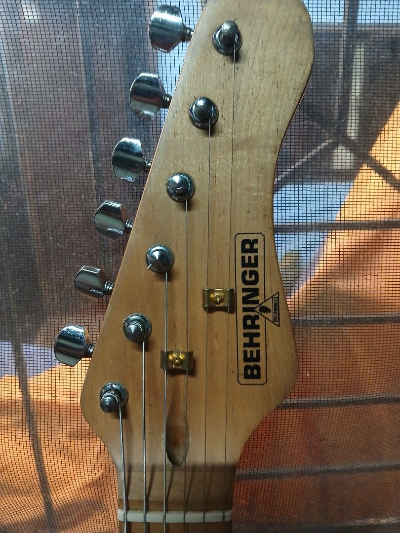 Behringer Electric Guitar - Black Strat Style (Category: Musical Instruments) located in Manila. Submitted by oddphoenix-4e1a (Listing ID 1453980542, Image 3). Description: P3,800 Pickup or lalamove Behringer Electric Guitar. Stratocaster style body. Maple neck with 22 frets. Three single-coil pickups. Chrome hardware. Includes a small practice amplifier. .