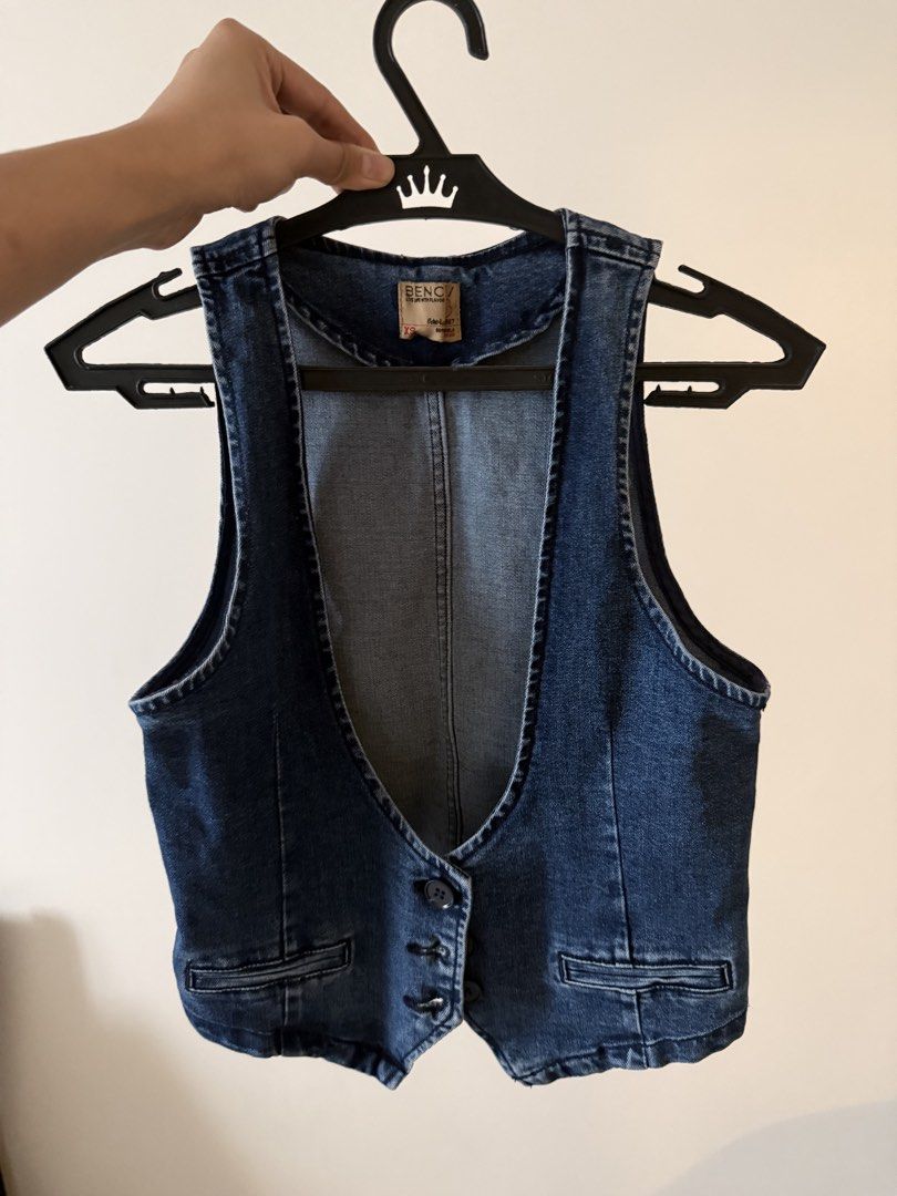 BENCH Denim Vest - Size XS (Category: Coats, Jackets and Outerwear) located in Pasig City. Submitted by riusables (Listing ID 1453898980, Image 1). Description: - BENCH Denim Vest - Classic blue wash - Button-up front - Two chest pockets - Size XS - Ideal for layering over t-shirts or dresses - Versatile wardrobe staple - Worn once just for an event.