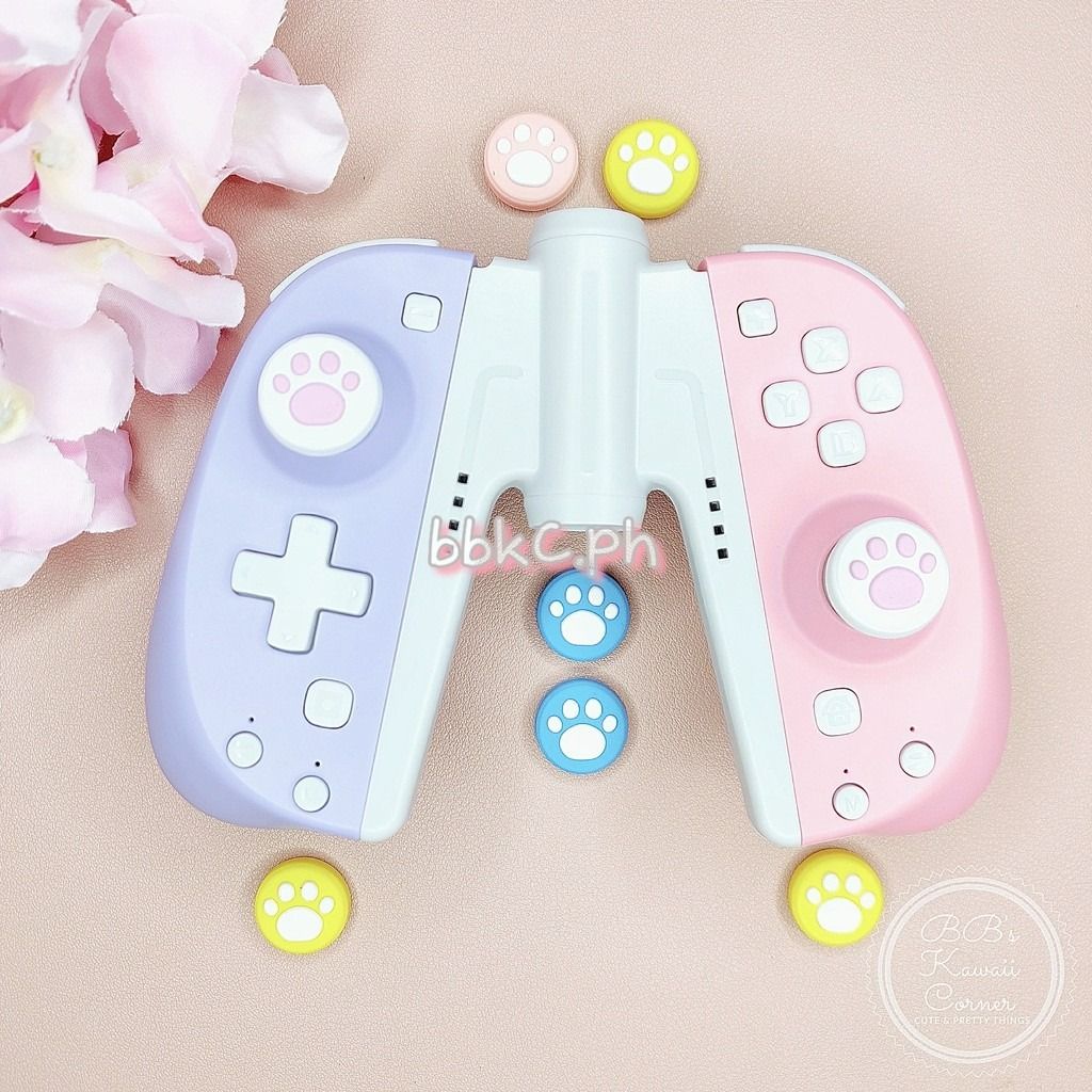 Big Paw Print Thumb Grips for Nintendo Switch / Switch Lite - 2pcs (Category: Controllers) located in Mandaluyong City. Submitted by bbkc.ph (Listing ID 1453631095, Image 2). Description: 🌸 Protects your original analog joysticks from dirt and wear and tear 🌸 May fit 3rd party controllers 🌸 Quantity: 2pcs 🌸 Material: Silicone 🌸 This variation has no cardboard packaging 🌸 Pictures posted are photos of the actual product 🌸 Please allow sligh