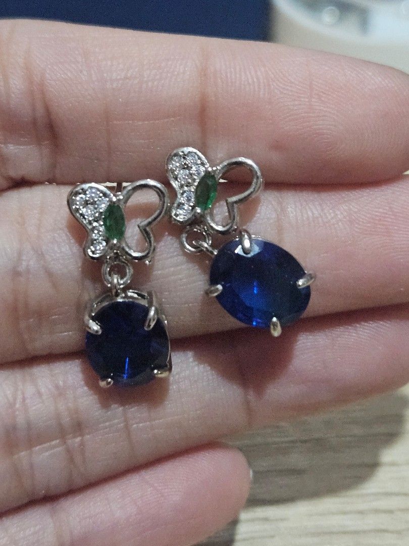 Blue Sapphire Stone Butterfly Dangling Earrings (Category: Earrings) located in Cainta. Submitted by Kahi0410 (Listing ID 1453839536, Image 1). Description: Natural Stone Platinum filled setting Oval Faceted Elegant design Hypoallergenic Safe for acidic, sensitive skin.