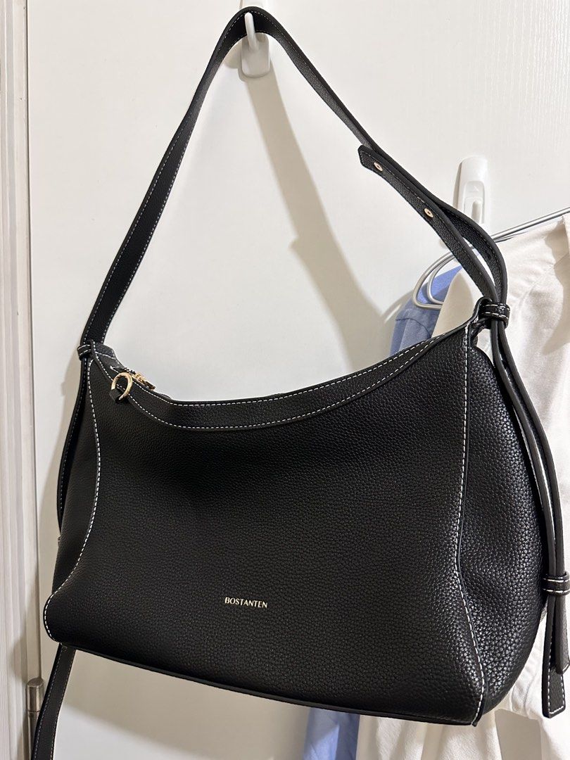 BOSTANTEN Black Leather Shoulder Bag (Category: Shoulder Bags) located in Taguig. Submitted by mandms09 (Listing ID 1453889165, Image 2). Description: Price negotiable! RFS: decluttering No rush please - Black pebbled leather shoulder bag - White contrast stitching - Gold hardware details - Zipper closure - Adjustable strap - Simple and classic design - Great for everyday use.