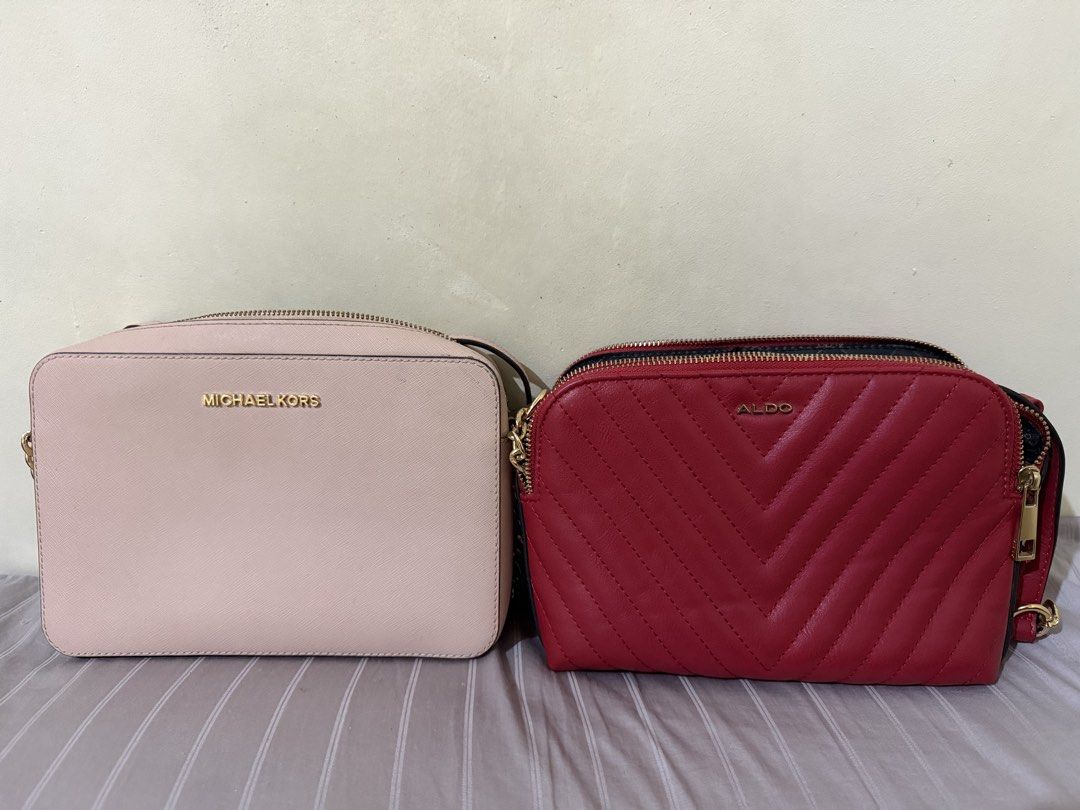 MICHAEL KORS and ALDO bundle bags (Category: Cross-body Bags) located in Magalang. Submitted by Letsdeclutter_sqs19 (Listing ID 1453971882, Image 1). Description: - Red ALDO crossbody bag (good as new) - Stylish quilted chevron pattern - Gold chain strap and zipper details - Two main compartments for organization - Compact and perfect for carrying essentials Pink MICHAEL KORS -lightly used - with minimal flaws - please see photos for reference. P