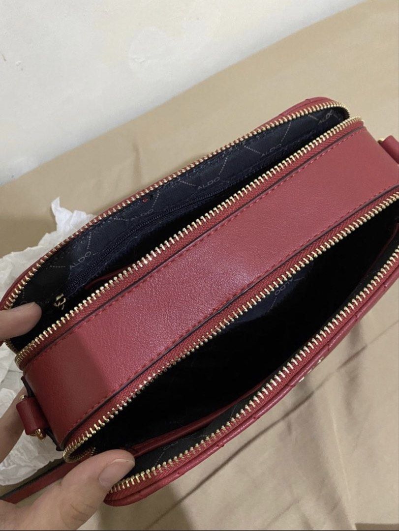 MICHAEL KORS and ALDO bundle bags (Category: Cross-body Bags) located in Magalang. Submitted by Letsdeclutter_sqs19 (Listing ID 1453971882, Image 3). Description: - Red ALDO crossbody bag (good as new) - Stylish quilted chevron pattern - Gold chain strap and zipper details - Two main compartments for organization - Compact and perfect for carrying essentials Pink MICHAEL KORS -lightly used - with minimal flaws - please see photos for reference. P